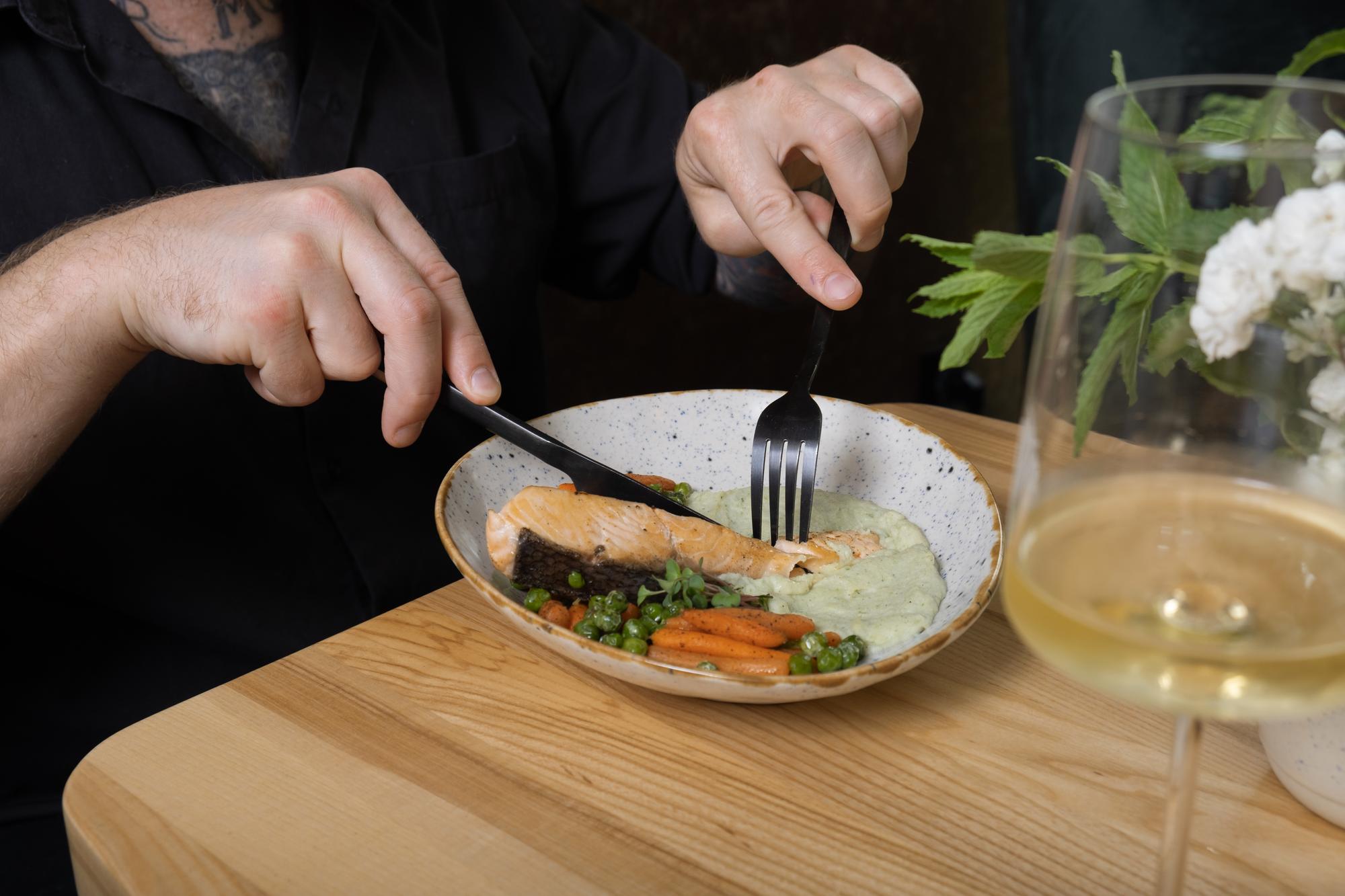 In-home chef preparing a plated course